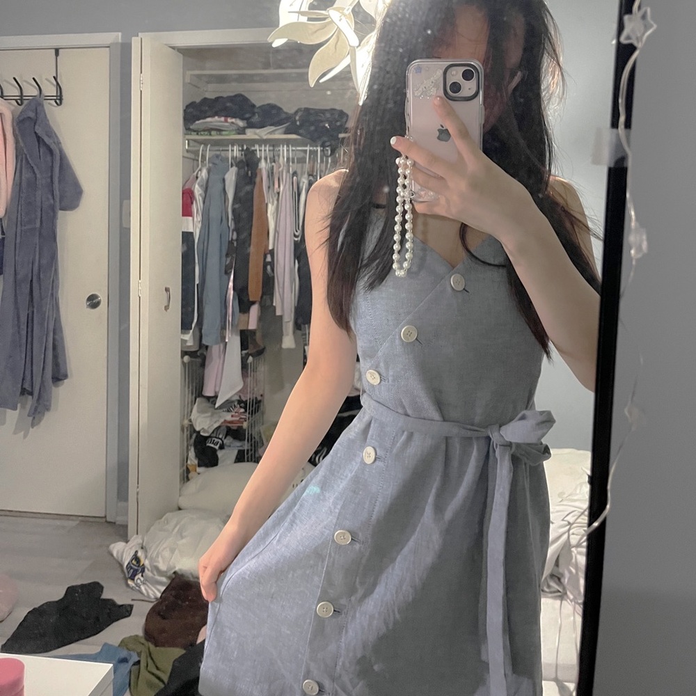 Banana Republic vintage baby blue light denim dress. Adorned with white buttons